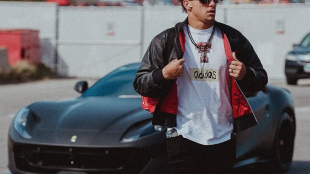 Patrick Mahomes wears a Texas Tech shirt designed by adidas.